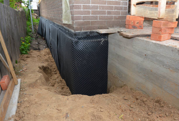 Happy homeowners after waterproofing job in Brunswick